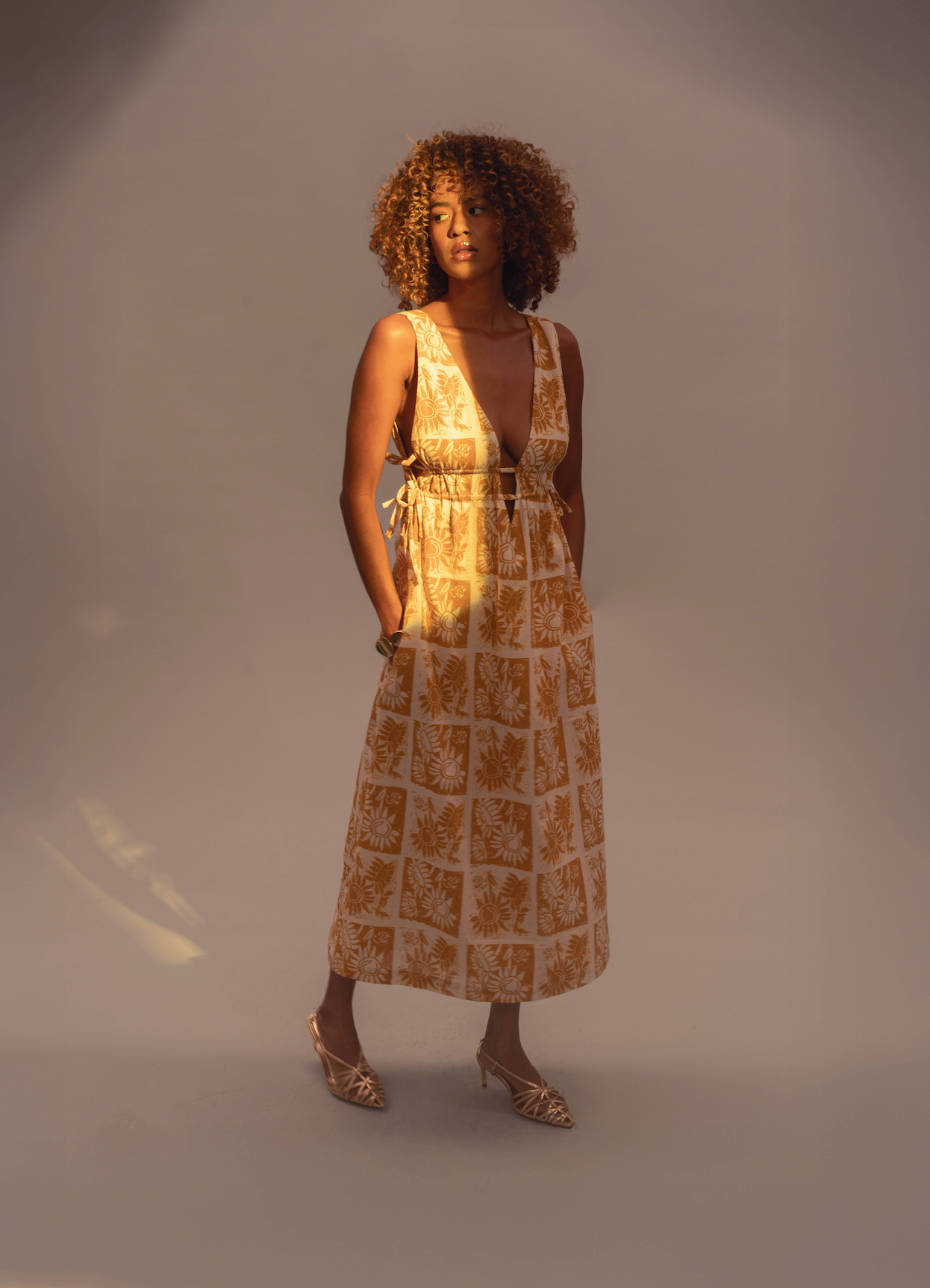 V-neck dress with a chess pattern